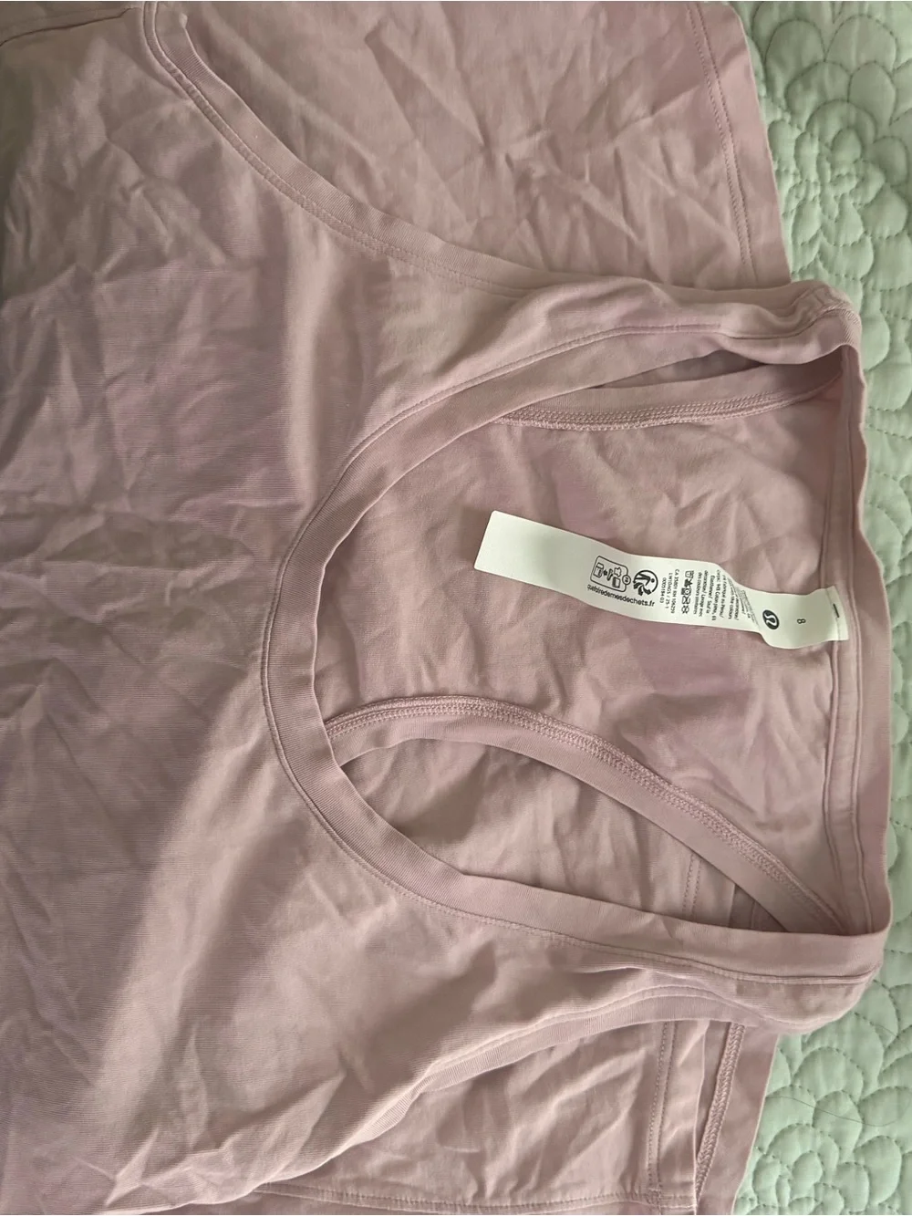 Two Lululemon love tanks